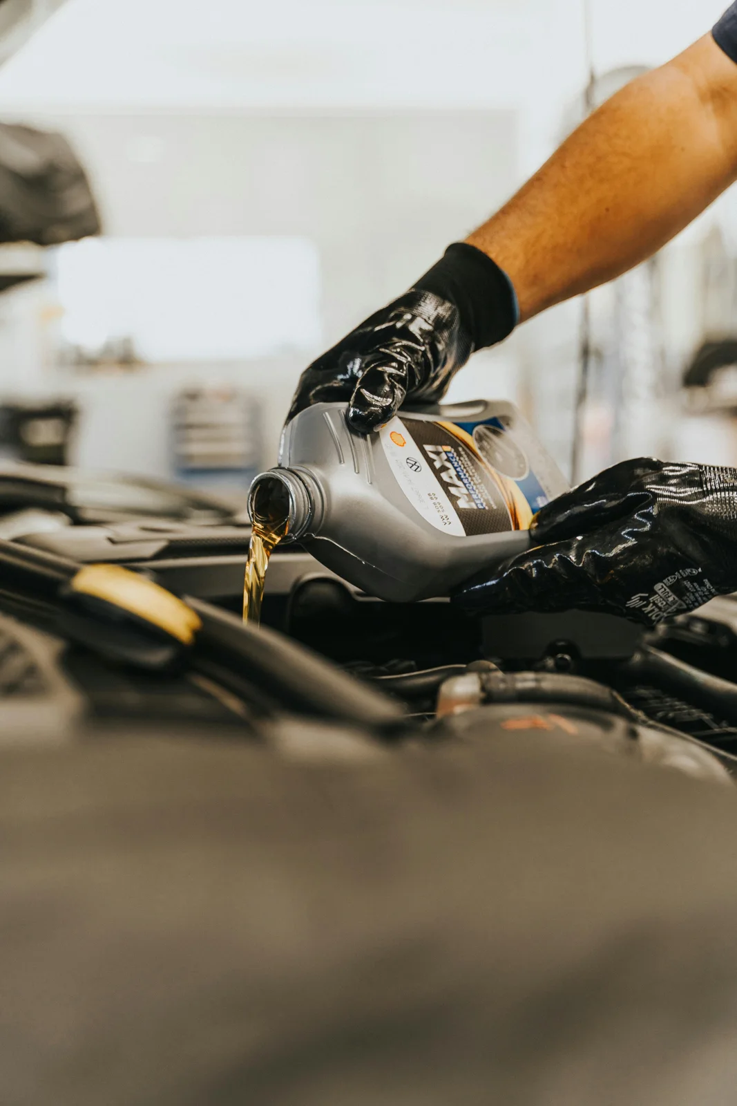 Engine oil being poured during routine maintenance