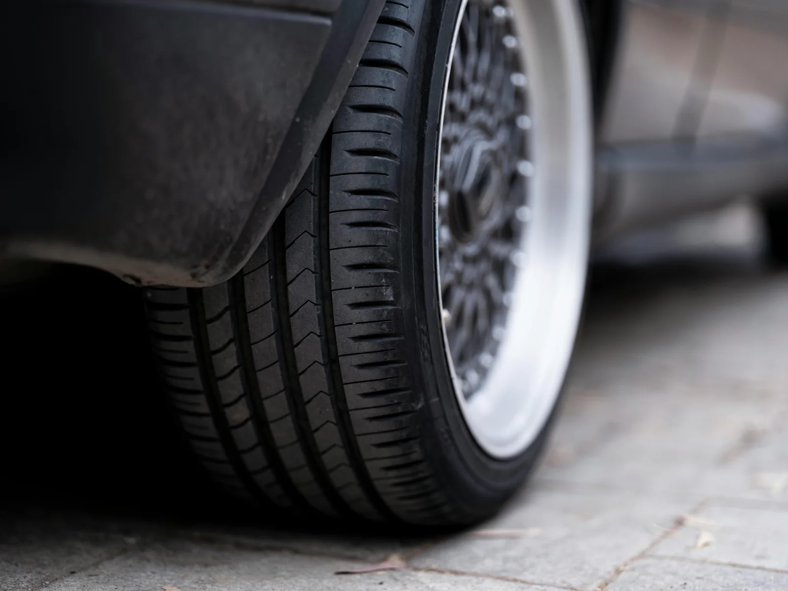 Close-up of tyre tread and sidewall